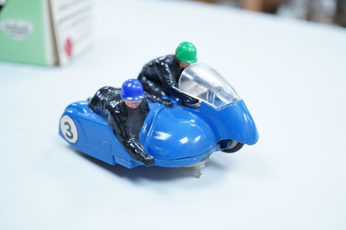 A boxed Tri-ang Scalextric T. C. Seat 600 (C-31) in red, with correct red spot box, together with an unboxed Hurricane combination motorcycle and sidecar MM/82